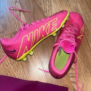 Nike Bright Pink Soccer Cleats with Yellow Details
